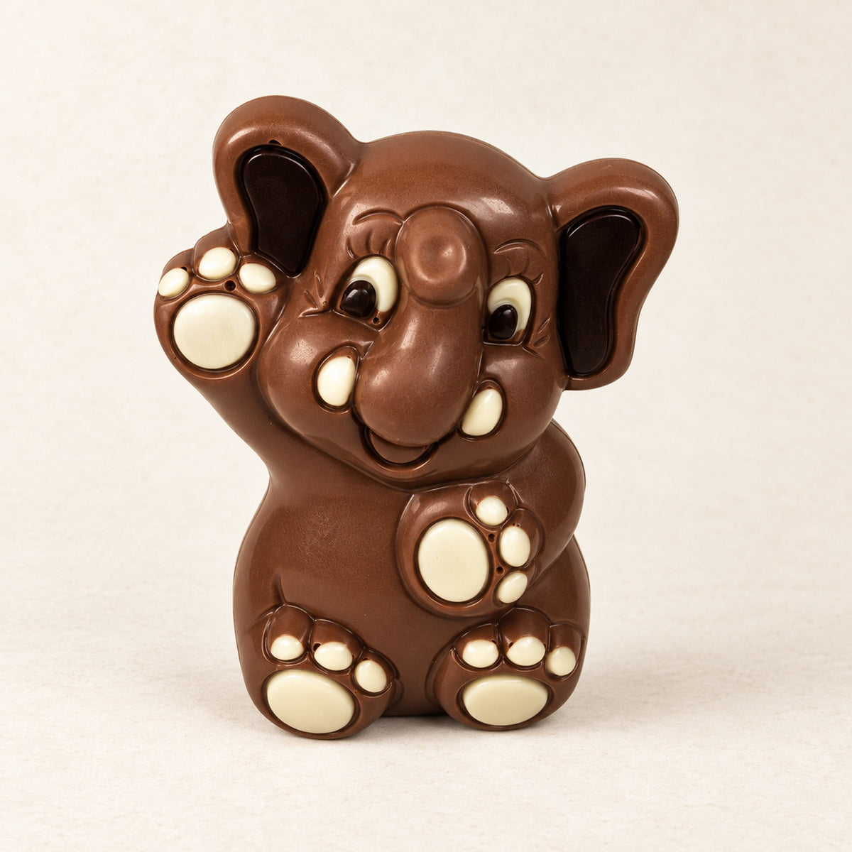 Gekleurde zwaaiende chocolade olifant